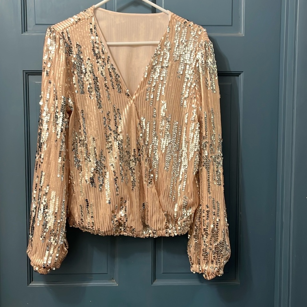Women’s V-Neck Sequin Top with elastic cuffs and waist
NWOT